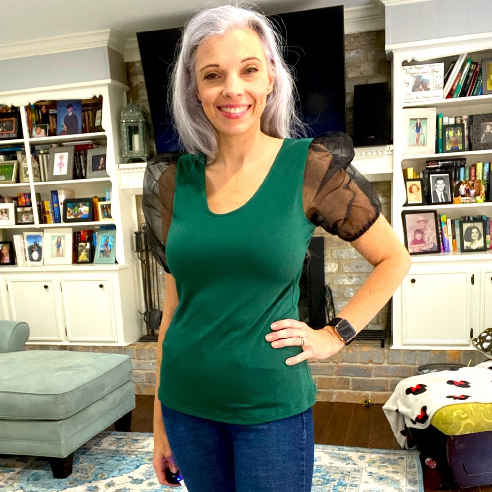 Small dark green top with puffy sleeves